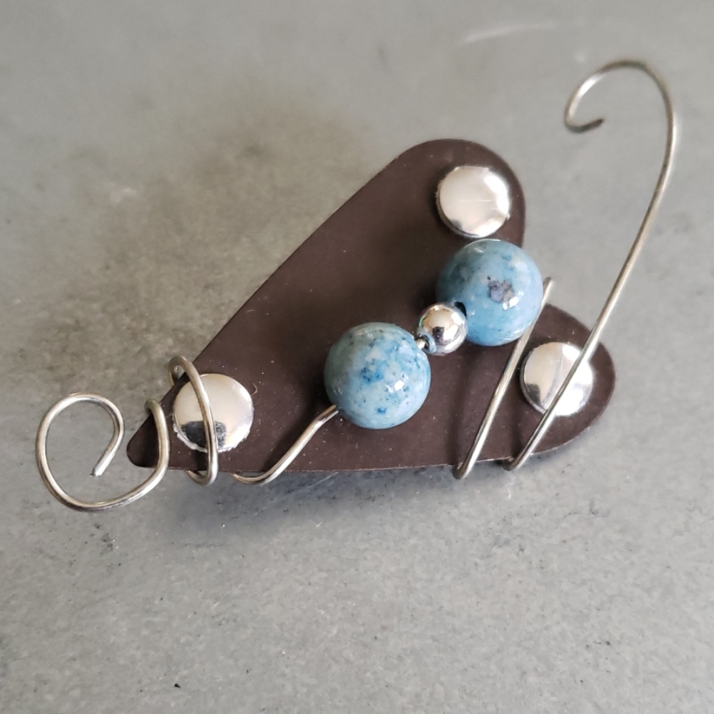 Cooper heart shaped pin with turquoise beads